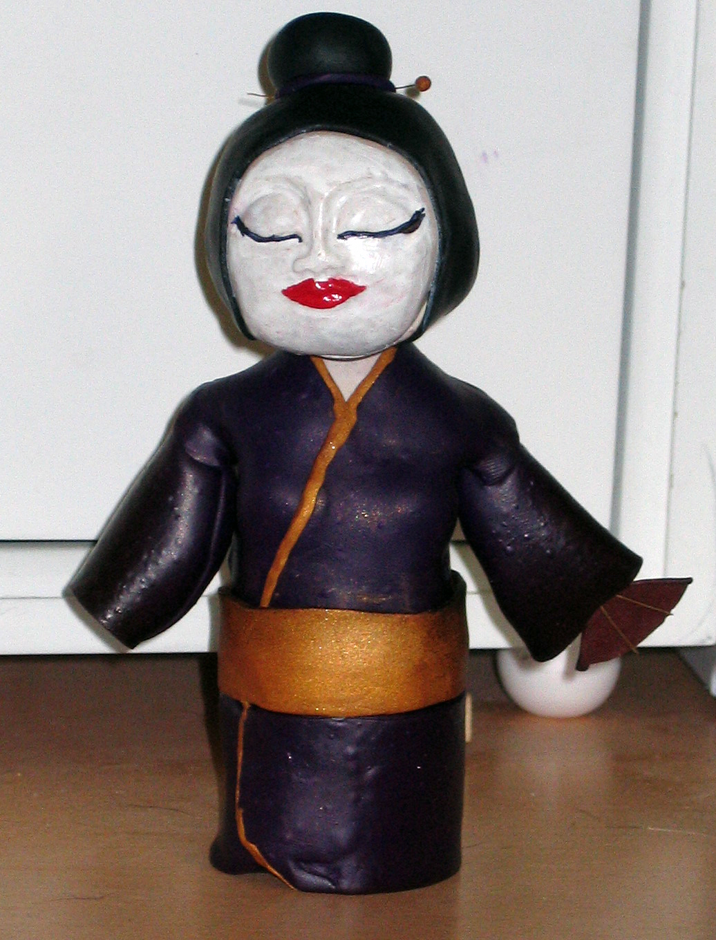 Bobble head geisha