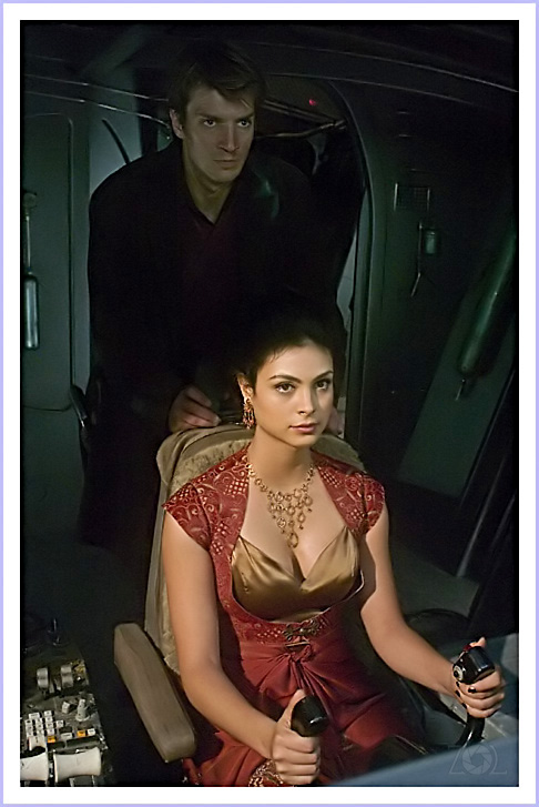 Back spaceship driver Mal with Inara in the pilot seat :)