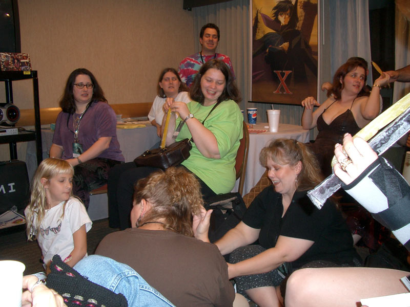 Browncoats in Con suite watching Firefly