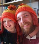 A man walkes down the street in a hat like that...